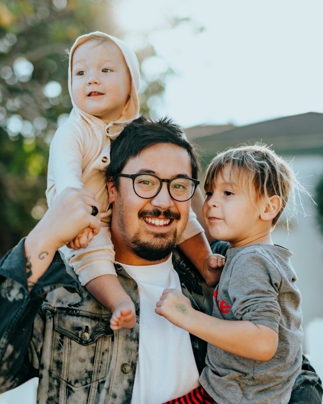 Family laughing together during an at-home session
